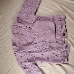 A cute set of a sweater and crop